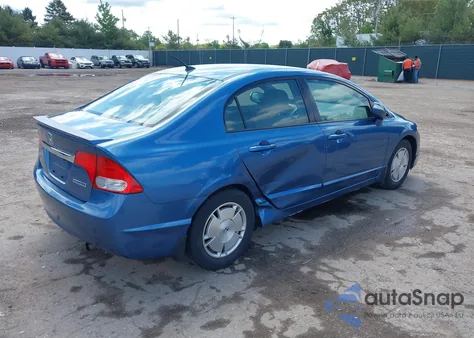 2009 Honda Civic Hybrid from USA, damaged, VIN JHMFA36219S017973